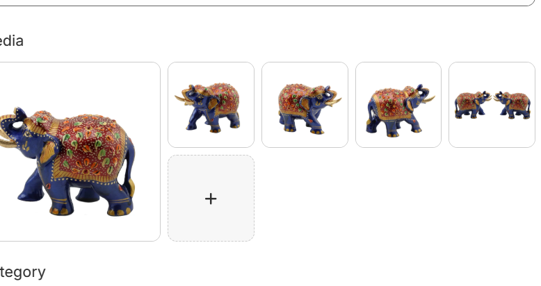 Meenakari art elephant figurine in royal blue with red and gold floral enamel caparison and upward trunk shown individually and as a pair from multiple angles