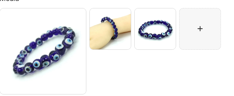 Blue evil eye nazar bracelet with deep blue purple glass beads featuring classic evil eye motif shown on white background worn on wrist and top angle view